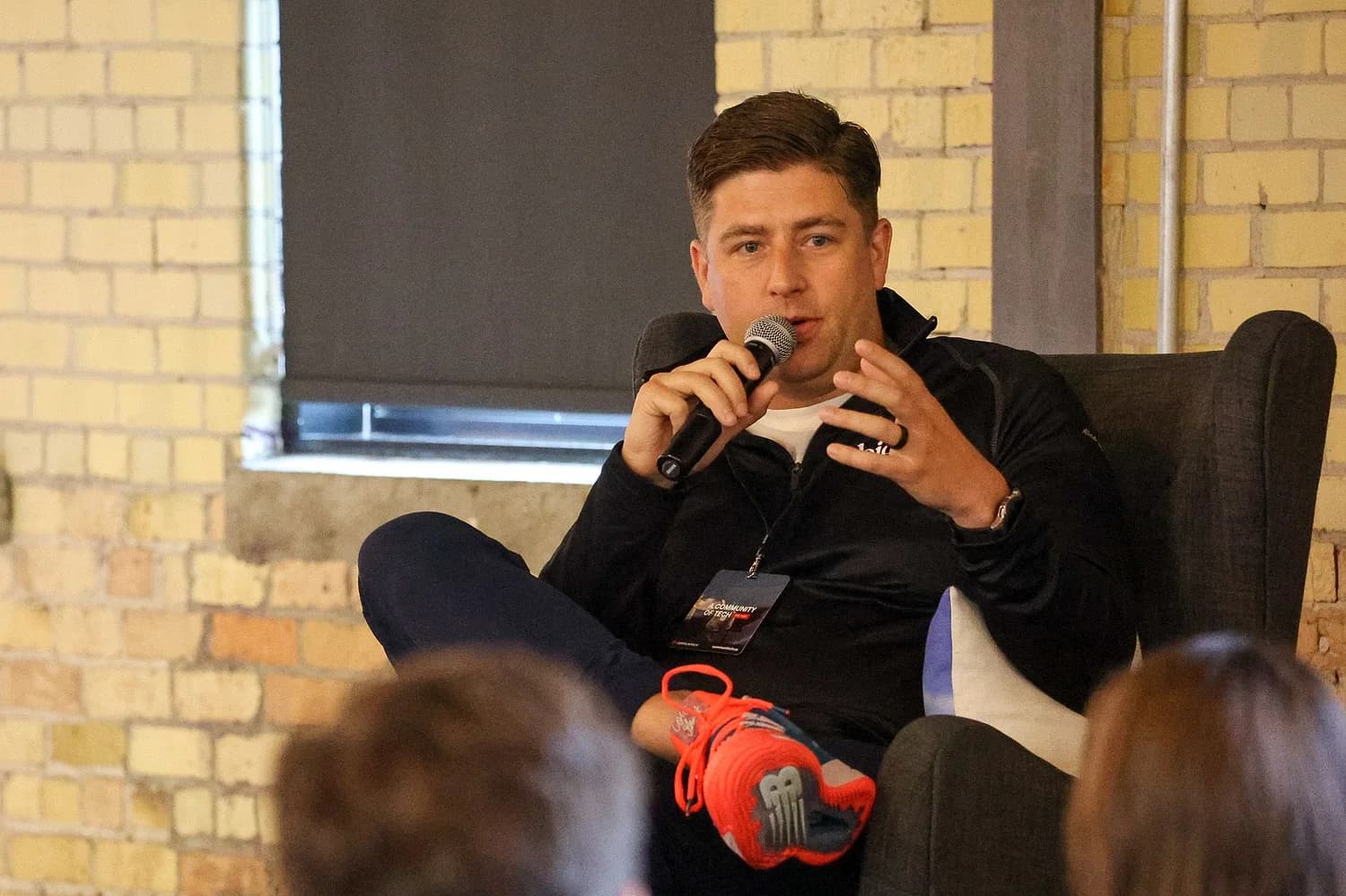 Jon Christensen speaking on a panel at a Communitech breakfast